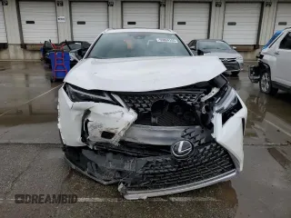 2023 Lexus UX 250h Premium with VIN JTHP9JBH5P2065064, listed as a Copart auction lot 55804155 with 25,204 mi miles and Salvage title. Bid and sale history available at DreamBid. Image 5.