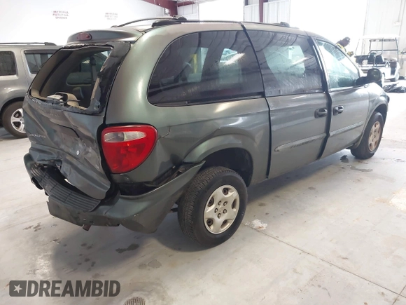 2003 Dodge Caravan SE with VIN 1D4GP24313B191319, listed as a IAAI auction lot 41398477 with 220,083 mi miles. Bid and sale history available at carsss.com. Image 4.