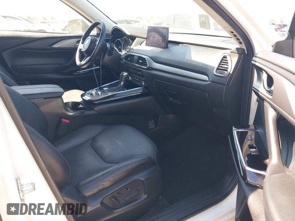 2020 Mazda CX-9 Touring with VIN JM3TCACY6L0403584, listed as a IAAI auction lot 41784589 with 55,328 mi miles and . Bid and sale history available at DreamBid. Image 5.