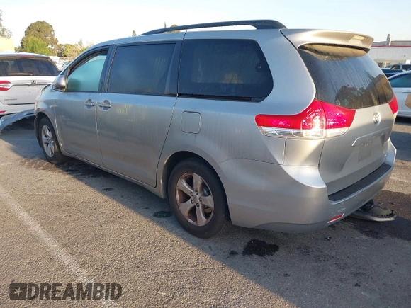 2014 Toyota Sienna LE AAS with VIN 5TDKK3DC1ES520561, listed as a IAAI auction lot 41959565 with 115,908 mi miles and . Bid and sale history available at carsss.com. Image 3.