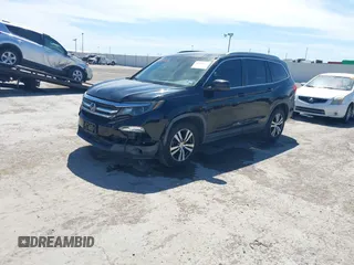 2016 Honda Pilot EX-L with VIN 5FNYF6H58GB018830, listed as a IAAI auction lot 41814636 with 147,242 mi miles. Bid and sale history available at carsss.com. Image 17.