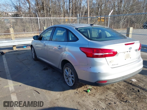 2018 Ford Focus SE with VIN 1FADP3F28JL239860, listed as a IAAI auction lot 41497350 with 84,666 mi miles. Bid and sale history available at carsss.com. Image 3.