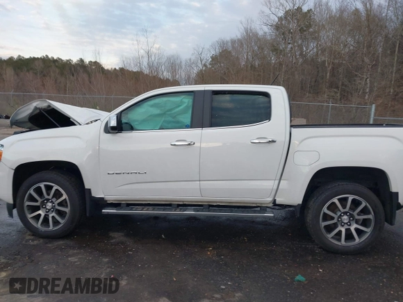 2021 GMC Canyon 4WD Denali with VIN 1GTG6EEN6M1240894, listed as a IAAI auction lot 41387786 with 73,323 mi miles. Bid and sale history available at carsss.com. Image 14.