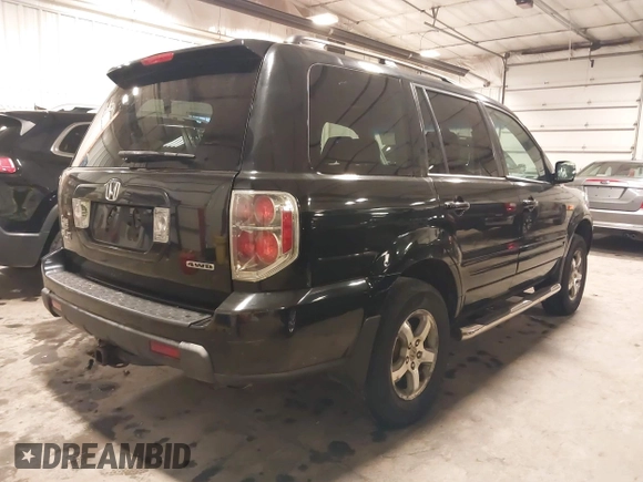 2007 Honda Pilot EX-L with VIN 5FNYF18677B017230, listed as a IAAI auction lot 41727853 with 257,527 mi miles and . Bid and sale history available at DreamBid. Image 4.