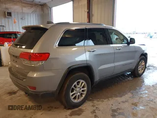 2019 Jeep Grand Cherokee Laredo E with VIN 1C4RJFAG8KC823814, listed as a IAAI auction lot 41728782 with 120,695 mi miles. Bid and sale history available at carsss.com. Image 4.