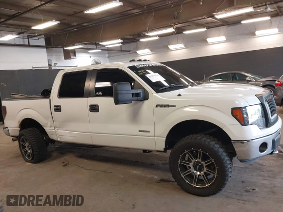 2013 Ford F-150 XL with VIN 1FTFW1ET8DFB48563, listed as a IAAI auction lot 42103243 with 257,778 mi miles. Bid and sale history available at carsss.com. Image 13.