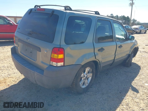 2007 Ford Escape XLT with VIN 1FMCU03137KB28362, listed as a IAAI auction lot 41689766 with 154,345 mi miles and . Bid and sale history available at DreamBid. Image 4.