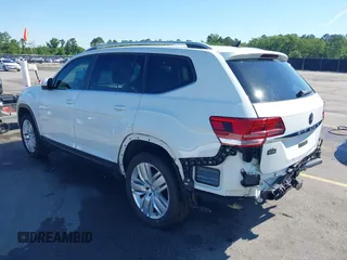 2019 Volkswagen Atlas SE z VIN 1V2WR2CA3KC503490, wystawiony jako IAAI lot #42168340 z przebiegiem 70 868 mil mil oraz . Historia ofert i sprzedaży dostępna na DreamBid. Obrazek 3.