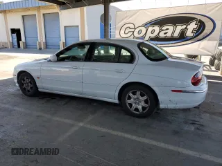 2000 Jaguar S-Type V8 z VIN SAJDA01D7YGL39410, wystawiony jako Copart lot #56814185 z przebiegiem 47 861 mil mil oraz Szkody całkowita. Historia ofert i sprzedaży dostępna na DreamBid. Obrazek 2.