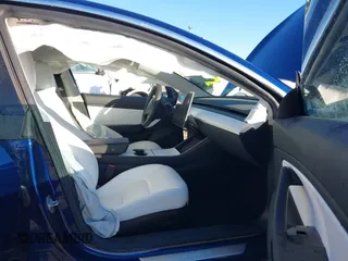 2019 Tesla Model 3 Long Range with VIN 5YJ3E1EB7KF454636, listed as a IAAI auction lot 41853972 with 56,916 mi miles. Bid and sale history available at carsss.com. Image 5.