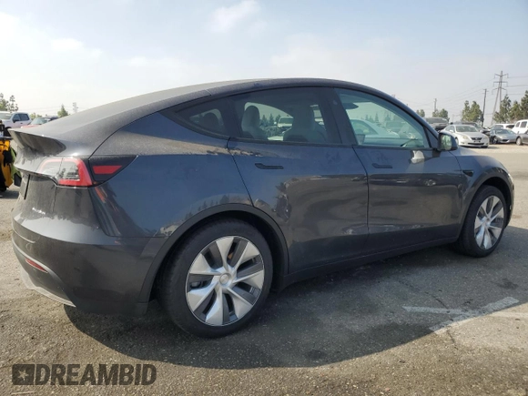 2024 Tesla Model Y Long Range with VIN 7SAYGDEE1RA266653, listed as a Copart auction lot 62277865 with 8,189 mi miles and Salvage title. Bid and sale history available at DreamBid. Image 3.