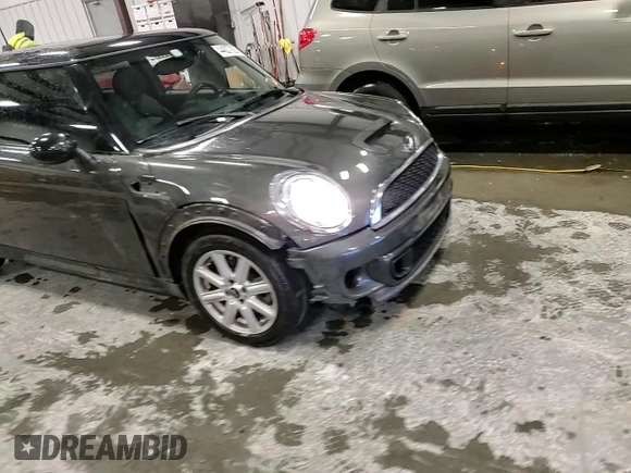 2013 MINI Hardtop S with VIN WMWSV3C53DT390693, listed as a Copart auction lot 44827925 with 131,411 mi miles and Salvage Title. Bid and sale history available at DreamBid. Image 11.