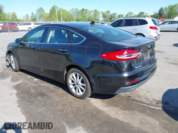 2019 Ford Fusion SEL with VIN 3FA6P0MU6KR252797, listed as a IAAI auction lot 41994504 with 106,029 mi miles and . Bid and sale history available at DreamBid. Image 3.