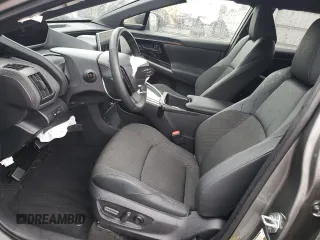 2024 Toyota bZ4X XLE with VIN JTMABACA3RA079406, listed as a Copart auction lot 56758445 with 3,483 mi miles and Salvage title. Bid and sale history available at DreamBid. Image 7.