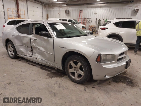 2009 Dodge Charger SE with VIN 2B3KA43V19H609614, listed as a IAAI auction lot 41515678 with 195,787 mi miles. Bid and sale history available at carsss.com. Image 1.