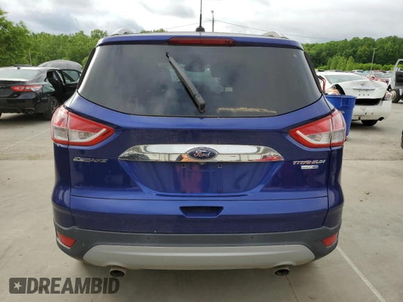 2015 Ford Escape Titanium with VIN 1FMCU9J99FUC22925, listed as a Copart auction lot 56871275 with 113,452 mi miles and Non Repairable. Bid and sale history available at DreamBid. Image 6.