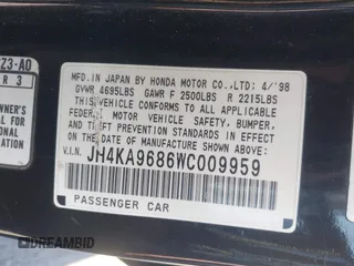 1998 Acura RL Special Edition with VIN JH4KA9686WC009959, listed as a IAAI auction lot 41632413 with 130,788 mi miles. Bid and sale history available at carsss.com. Image 9.