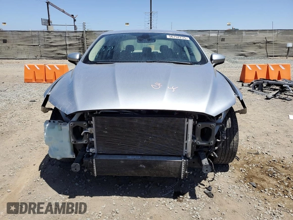 2020 Ford Fusion SE z VIN 3FA6P0HDXLR235383, wystawiony jako Copart lot #56752235 z przebiegiem 92 919 mil mil oraz Szkoda całkowita • Salvage title. Historia ofert i sprzedaży dostępna na DreamBid. Obrazek 5.