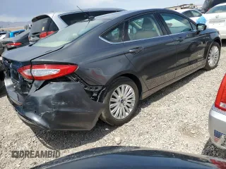 2016 Ford Fusion SE Hybrid with VIN 3FA6P0LU0GR406199, listed as a Copart auction lot 59146465 with 164,490 mi miles and Salvage title. Bid and sale history available at DreamBid. Image 3.