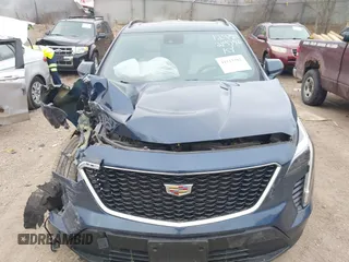2020 Cadillac XT4 AWD Sport with VIN 1GYFZFR48LF101467, listed as a IAAI auction lot 41113381 with 72,841 mi miles and . Bid and sale history available at DreamBid. Image 12.
