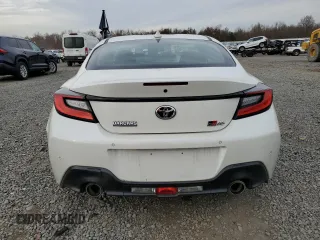 2023 Toyota GR86 with VIN JF1ZNBC17P8761781, listed as a Copart auction lot 80765984 with 8,717 mi miles and Salvage Title. Bid and sale history available at carsss.com. Image 6.