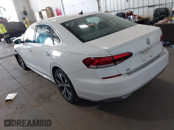 2021 Volkswagen Passat SE with VIN 1VWSA7A30MC014179, listed as a IAAI auction lot 42342358 with 77,535 mi miles and . Bid and sale history available at DreamBid. Image 3.