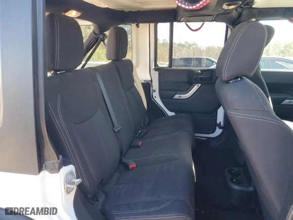 2017 Jeep Wrangler Unlimited Rubicon with VIN 1C4BJWFGXHL650171, listed as a Copart auction lot 84673424 with 72,313 mi miles and Clean Title. Bid and sale history available at carsss.com. Image 12.