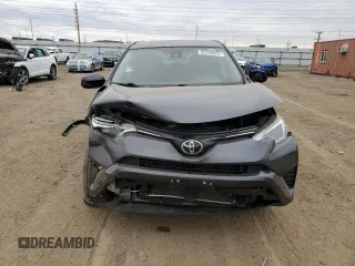 2018 Toyota RAV4 LE with VIN JTMBFREVXJJ226235, listed as a Copart auction lot 52299325 with 102,652 mi miles and Salvage Title. Bid and sale history available at carsss.com. Image 5.
