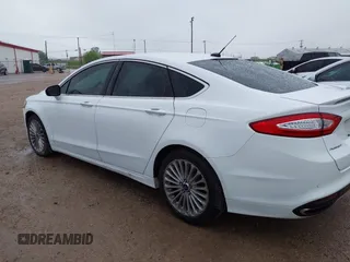 2016 Ford Fusion Titanium with VIN 3FA6P0K92GR400269, listed as a IAAI auction lot 41961043 with 191,638 mi miles and . Bid and sale history available at DreamBid. Image 14.