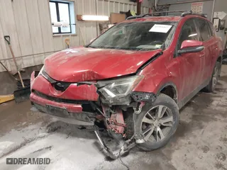 2017 Toyota RAV4 XLE with VIN JTMRFREV2HJ168971, listed as a IAAI auction lot 41504462 with 114,259 mi miles. Bid and sale history available at carsss.com. Image 6.