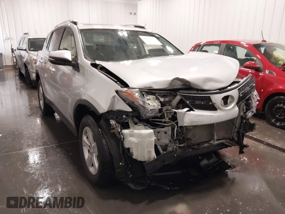 2014 Toyota RAV4 XLE with VIN JTMRFREV5ED052819, listed as a IAAI auction lot 42014672 with 235,481 mi miles and . Bid and sale history available at DreamBid. Image 6.