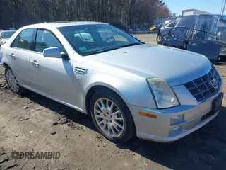 2011 Cadillac STS RWD w/1SB with VIN 1G6DW6ED8B0132119, listed as a IAAI auction lot 42001276 with 148,678 mi miles. Bid and sale history available at carsss.com. Image 1.