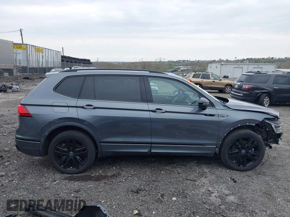 2022 Volkswagen Tiguan SE R-Line Black z VIN 3VVCB7AX9NM014741, wystawiony jako IAAI lot #42043123 z przebiegiem 71 777 mil mil oraz . Historia ofert i sprzedaży dostępna na DreamBid. Obrazek 14.