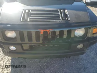 2003 Hummer H2 with VIN 5GRGN23UX3H136571, listed as a Copart auction lot 80823054 with 220,003 mi miles and Salvage Title. Bid and sale history available at carsss.com. Image 12.