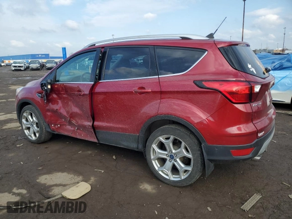 2019 Ford Escape Titanium with VIN 1FMCU9J91KUB56025, listed as a Copart auction lot 52856655 with 56,612 mi miles and Clean Title. Bid and sale history available at carsss.com. Image 2.
