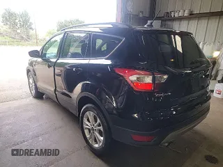 2018 Ford Escape SEL with VIN 1FMCU0HD4JUA75735, listed as a IAAI auction lot 42068983 with 96,935 mi miles and . Bid and sale history available at carsss.com. Image 1.