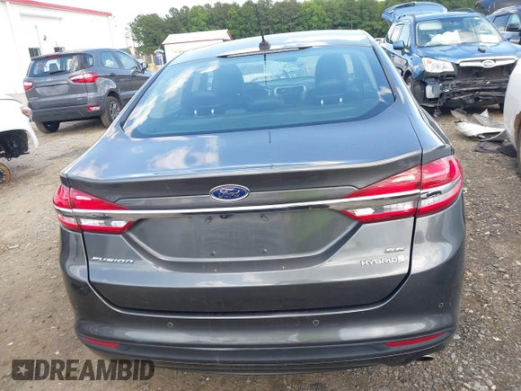 2017 Ford Fusion Hybrid SE z VIN 3FA6P0LU3HR260558, wystawiony jako IAAI lot #42657176 z przebiegiem 161 183 mil mil oraz . Historia ofert i sprzedaży dostępna na DreamBid. Obrazek 17.