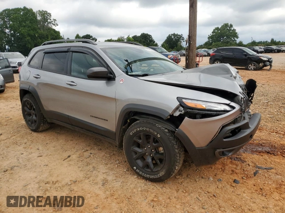 2016 Jeep Cherokee Trailhawk with VIN 1C4PJMBS4GW236966, listed as a Copart auction lot 63190565 with 101,017 mi miles and Salvage title. Bid and sale history available at DreamBid. Image 4.
