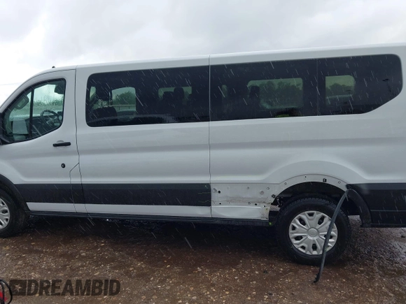 2023 Ford Transit Passenger XL with VIN 1FBAX2YG2PKA91028, listed as a IAAI auction lot 42106198 with 52,874 mi miles. Bid and sale history available at carsss.com. Image 14.