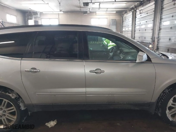 2015 Chevrolet Traverse LT with VIN 1GNKRGKD3FJ319541, listed as a IAAI auction lot 41592333 with 116,604 mi miles. Bid and sale history available at carsss.com. Image 13.