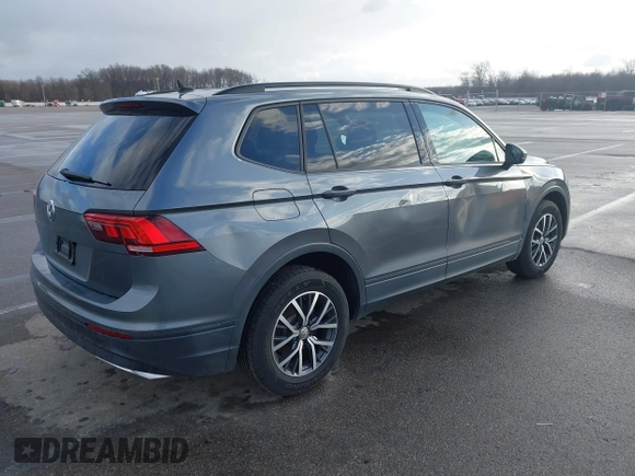 2021 Volkswagen Tiguan S with VIN 3VV1B7AX8MM016874, listed as a IAAI auction lot 41633090 with 76,857 mi miles and . Bid and sale history available at DreamBid. Image 4.