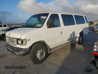 1997 Ford Econoline Wagon XL z VIN 1FBJS31L4VHA70557, wystawiony jako Copart lot #85202514 z przebiegiem 151 362 mil mil oraz Szkody całkowita. Historia ofert i sprzedaży dostępna na DreamBid. Obrazek 1.