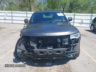 2017 Jeep Grand Cherokee Summit with VIN 1C4RJFJT9HC759417, listed as a IAAI auction lot 42199460 with 129,113 mi miles and . Bid and sale history available at DreamBid. Image 13.