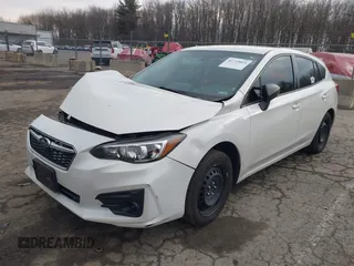 2017 Subaru Impreza with VIN 4S3GTAA68H3751534, listed as a IAAI auction lot 41719864 with 100,417 mi miles. Bid and sale history available at carsss.com. Image 2.