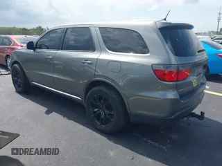 2013 Dodge Durango SXT with VIN 1C4RDHAGXDC500144, listed as a IAAI auction lot 42693122 with 194,519 mi miles and . Bid and sale history available at DreamBid. Image 3.