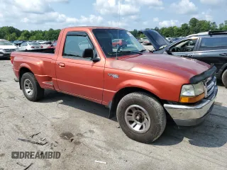 1998 Ford Ranger XL with VIN 1FTYR10C4WPB03883, listed as a Copart auction lot 64930944 with 257,722 mi miles and Salvage Title. Bid and sale history available at DreamBid. Image 4.
