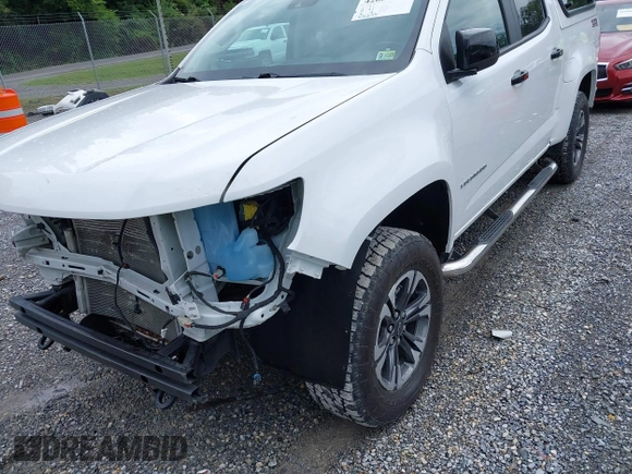 2021 Chevrolet Colorado 4WD Z71 with VIN 1GCGTDEN3M1122062, listed as a IAAI auction lot 42687632 with 52,233 mi miles and . Bid and sale history available at DreamBid. Image 17.