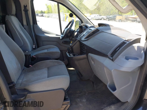 2015 Ford Transit Cargo z VIN 1FTBW2YG7FKA20201, wystawiony jako IAAI lot #42253463 z przebiegiem 83 235 mil mil oraz . Historia ofert i sprzedaży dostępna na DreamBid. Obrazek 5.