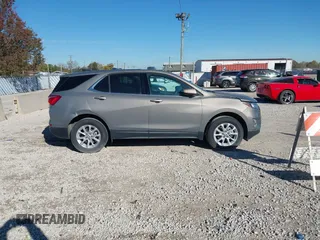2018 Chevrolet Equinox LT z VIN 3GNAXSEV7JS621706, wystawiony jako IAAI lot #40760827 z przebiegiem 36 051 mil mil oraz . Historia ofert i sprzedaży dostępna na DreamBid. Obrazek 13.