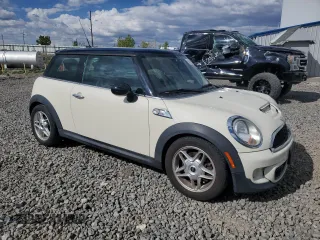 2011 MINI Hardtop S with VIN WMWSV3C57BTY14678, listed as a Copart auction lot 55501545 with 119,995 mi miles and Salvage title. Bid and sale history available at DreamBid. Image 4.